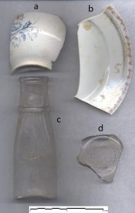 Sherds of historic porcelain and glass recovered from excavations.