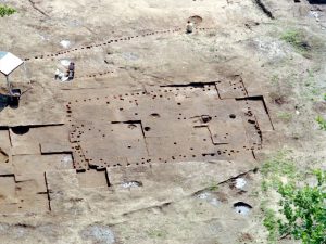 Aerial view of excavated area, showing house foundation uncovered during fieldwork.