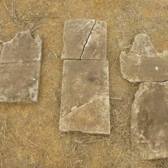 Rectangular stone artifacts discovered at the site.