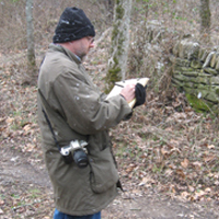 Profile photo of Trent conducting fieldwork.