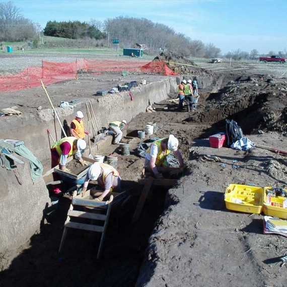 CRA crew working inside an expansive trench.