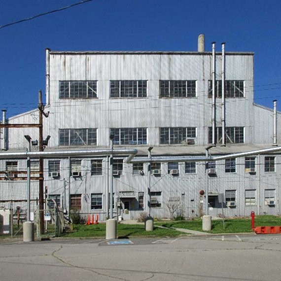 Large metal building within the Oak Ridge National Laboratory.
