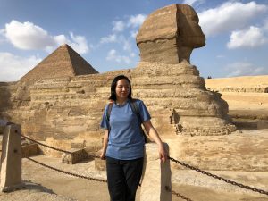Li standing in front of the Sphynx.
