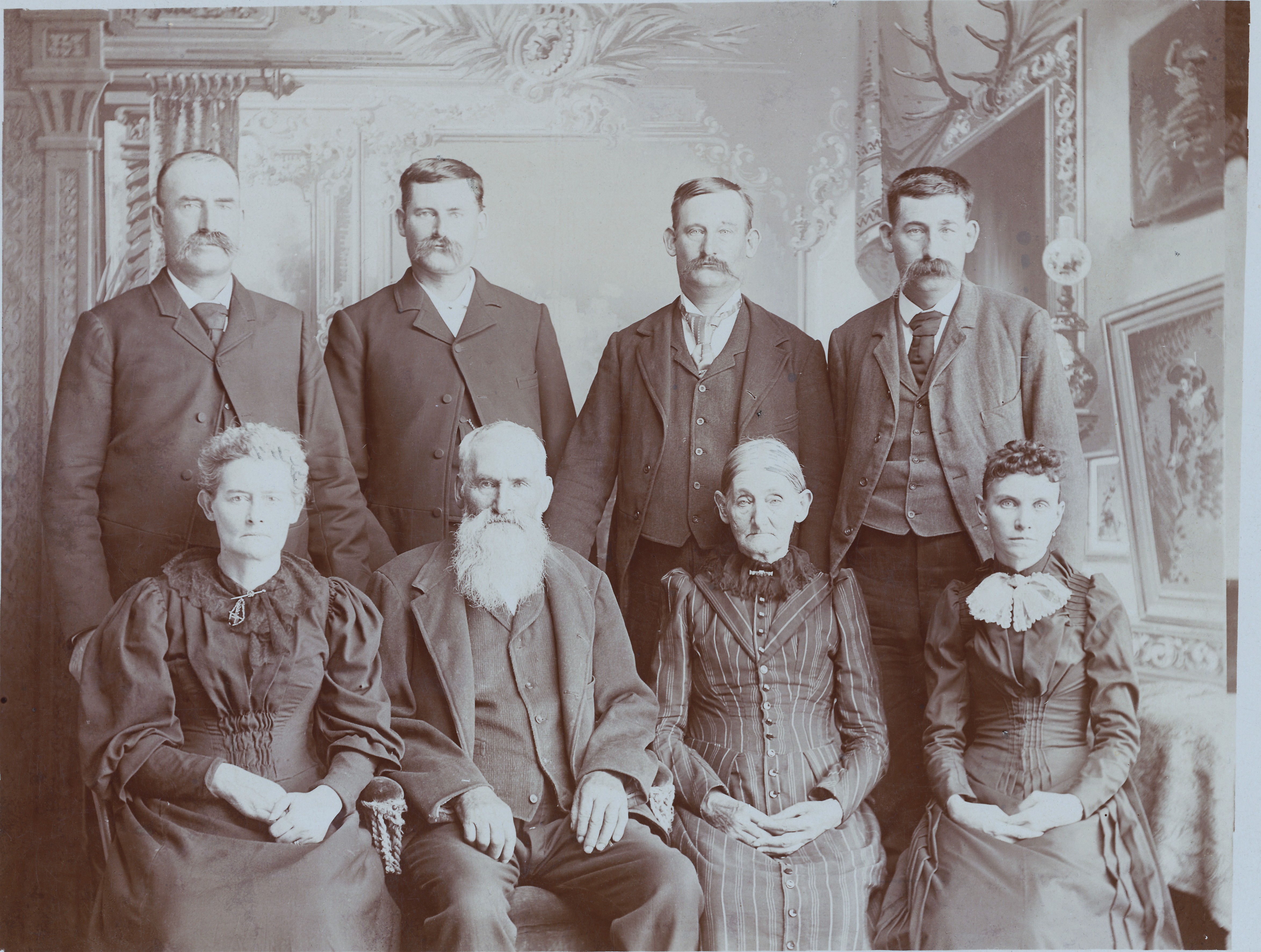 Historic photo of eight Niquette family members.